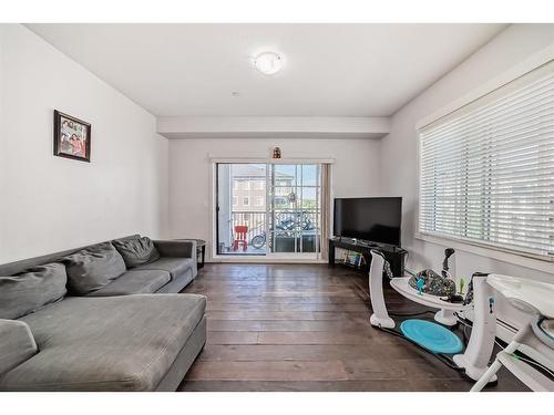 2320-215 Legacy Boulevard Se, Calgary, AB - Indoor Photo Showing Living Room