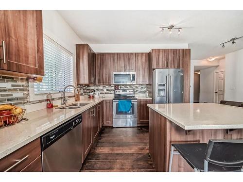 2320-215 Legacy Boulevard Se, Calgary, AB - Indoor Photo Showing Kitchen With Double Sink With Upgraded Kitchen