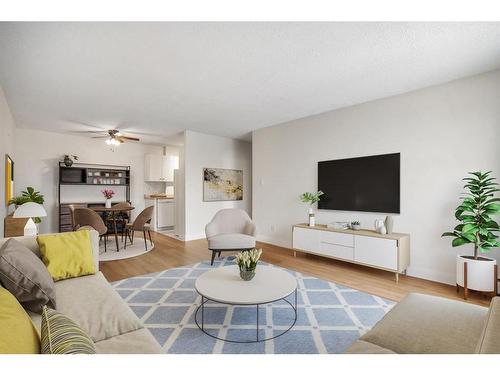 18B-80 Galbraith Drive Sw, Calgary, AB - Indoor Photo Showing Living Room