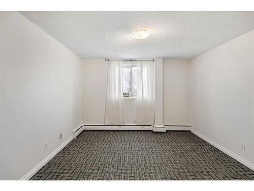 18B-80 Galbraith Drive Sw, Calgary, AB - Indoor Photo Showing Other Room