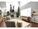 26 Elgin Park Road Se, Calgary, AB  - Indoor Photo Showing Living Room With Fireplace 