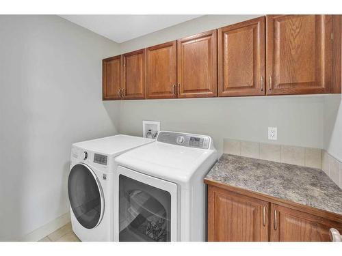 72 Sherwood Way Nw, Calgary, AB - Indoor Photo Showing Laundry Room