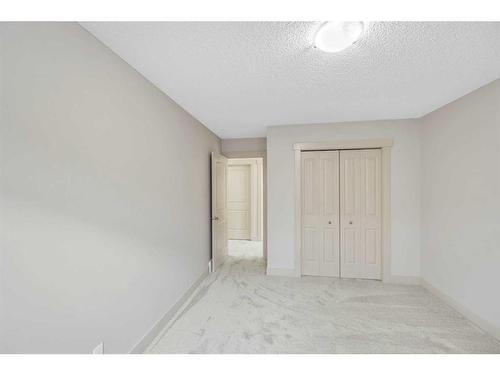 72 Sherwood Way Nw, Calgary, AB - Indoor Photo Showing Bedroom