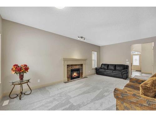 72 Sherwood Way Nw, Calgary, AB - Indoor Photo Showing Living Room With Fireplace