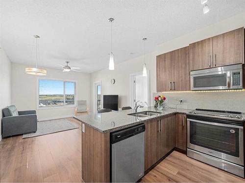 314-20 Sage Hill Terrace Nw, Calgary, AB - Indoor Photo Showing Kitchen With Double Sink With Upgraded Kitchen