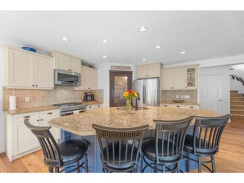 7 Jumping Pound Terrace, Cochrane, AB - Indoor Photo Showing Kitchen With Upgraded Kitchen