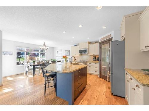 7 Jumping Pound Terrace, Cochrane, AB - Indoor Photo Showing Kitchen With Upgraded Kitchen