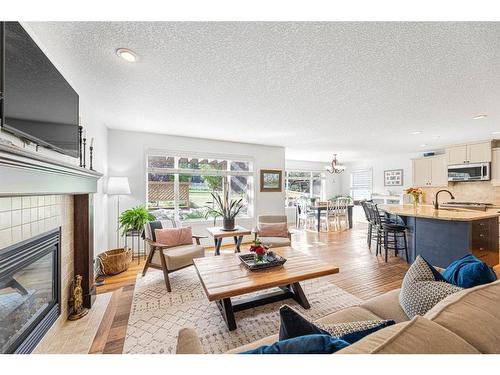 7 Jumping Pound Terrace, Cochrane, AB - Indoor Photo Showing Living Room With Fireplace