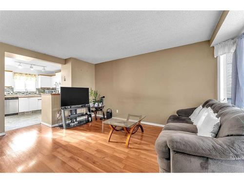 31 Martin Crossing Rise Ne, Calgary, AB - Indoor Photo Showing Living Room