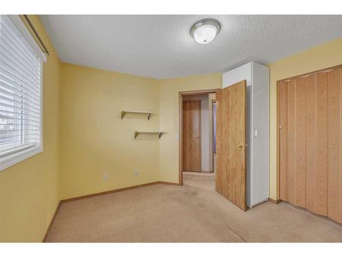 14 Saddlemont Manor Ne, Calgary, AB - Indoor Photo Showing Other Room