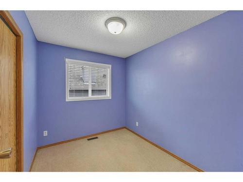 14 Saddlemont Manor Ne, Calgary, AB - Indoor Photo Showing Other Room