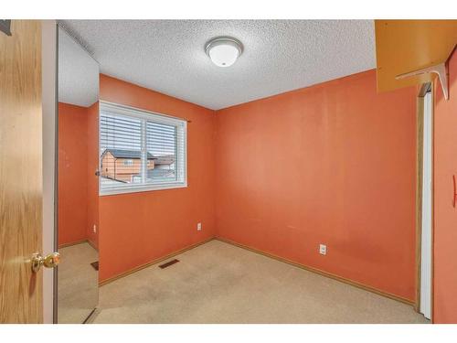 14 Saddlemont Manor Ne, Calgary, AB - Indoor Photo Showing Other Room