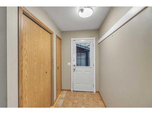 14 Saddlemont Manor Ne, Calgary, AB - Indoor Photo Showing Other Room