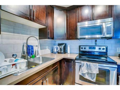 713 Auburn Bay Square Se, Calgary, AB - Indoor Photo Showing Kitchen