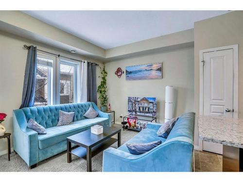 713 Auburn Bay Square Se, Calgary, AB - Indoor Photo Showing Living Room