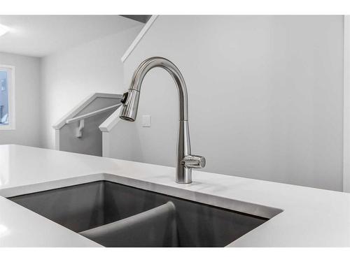 127 Aquila Drive Nw, Calgary, AB - Indoor Photo Showing Kitchen With Double Sink