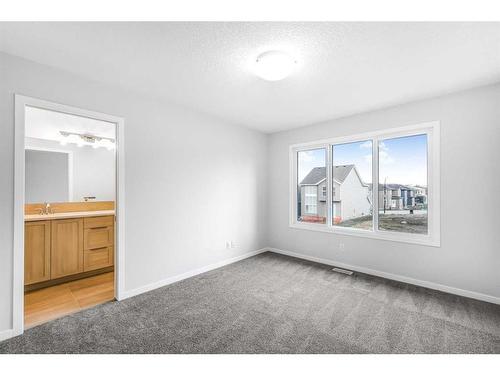 127 Aquila Drive Nw, Calgary, AB - Indoor Photo Showing Other Room