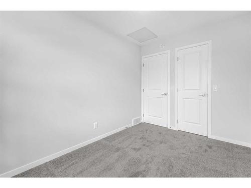 127 Aquila Drive Nw, Calgary, AB - Indoor Photo Showing Other Room