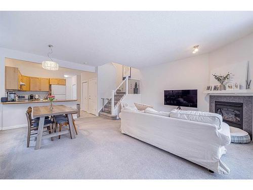 12 Royal Manor Nw, Calgary, AB - Indoor With Fireplace