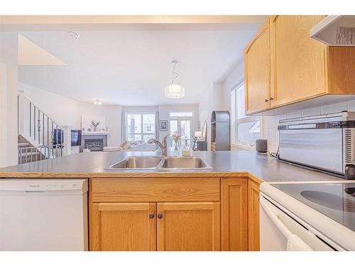 12 Royal Manor Nw, Calgary, AB - Indoor Photo Showing Kitchen With Double Sink