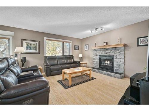 152 Del Ray Close Ne, Calgary, AB - Indoor Photo Showing Living Room With Fireplace