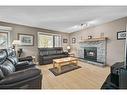 152 Del Ray Close Ne, Calgary, AB  - Indoor Photo Showing Living Room With Fireplace 