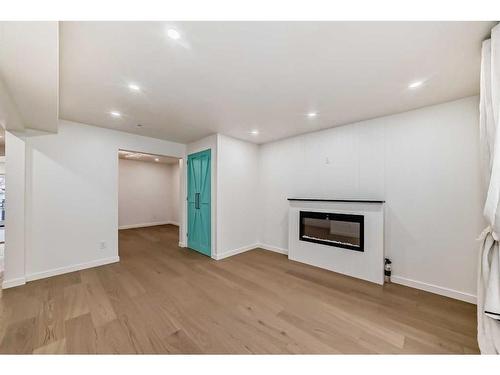 2210 15A Street Se, Calgary, AB - Indoor With Fireplace