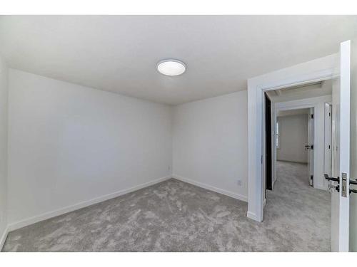 2210 15A Street Se, Calgary, AB - Indoor Photo Showing Other Room