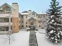 1201-7451 Springbank Boulevard Sw, Calgary, AB  - Outdoor With Facade 