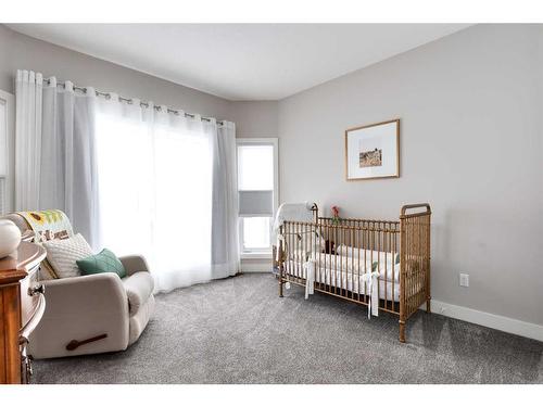 702 Fairways Drive, Vulcan, AB - Indoor Photo Showing Bedroom