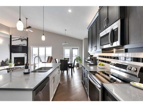 702 Fairways Drive, Vulcan, AB - Indoor Photo Showing Kitchen With Double Sink With Upgraded Kitchen