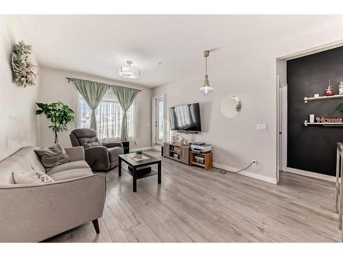 105-12 Sage Hill Terrace Nw, Calgary, AB - Indoor Photo Showing Living Room