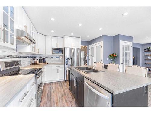 215 West Creek Close, Chestermere, AB - Indoor Photo Showing Kitchen With Double Sink With Upgraded Kitchen