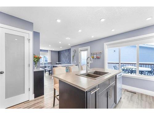 215 West Creek Close, Chestermere, AB - Indoor Photo Showing Kitchen With Double Sink