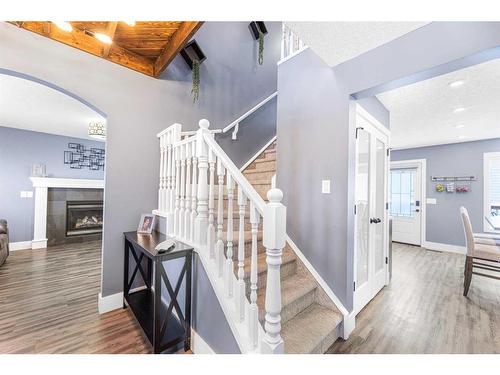 215 West Creek Close, Chestermere, AB - Indoor Photo Showing Other Room With Fireplace