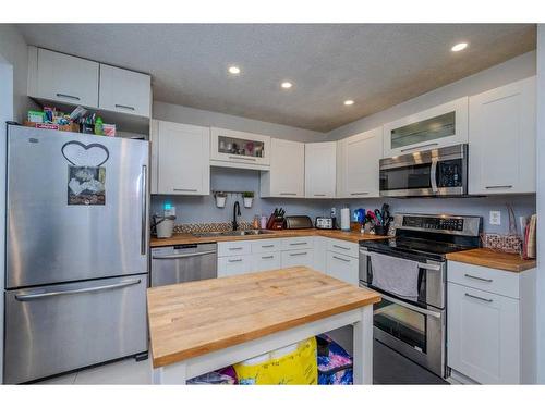 456 Cannington Close Sw, Calgary, AB - Indoor Photo Showing Kitchen With Stainless Steel Kitchen With Double Sink