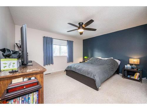 456 Cannington Close Sw, Calgary, AB - Indoor Photo Showing Bedroom