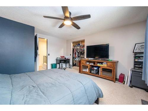 456 Cannington Close Sw, Calgary, AB - Indoor Photo Showing Bedroom