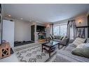 456 Cannington Close Sw, Calgary, AB  - Indoor Photo Showing Living Room With Fireplace 