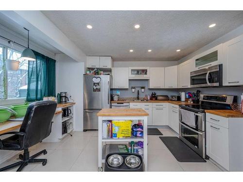 456 Cannington Close Sw, Calgary, AB - Indoor Photo Showing Kitchen With Stainless Steel Kitchen