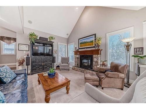 12 Majestic Gate, Rural Rocky View County, AB - Indoor Photo Showing Living Room With Fireplace