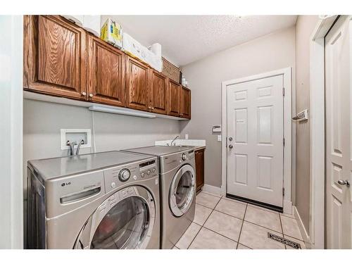 12 Majestic Gate, Rural Rocky View County, AB - Indoor Photo Showing Laundry Room