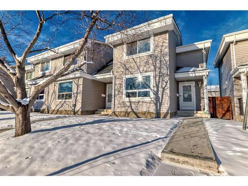 5-4360 58 Street Ne, Calgary, AB - Outdoor With Facade