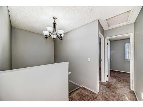 5-4360 58 Street Ne, Calgary, AB - Indoor Photo Showing Other Room