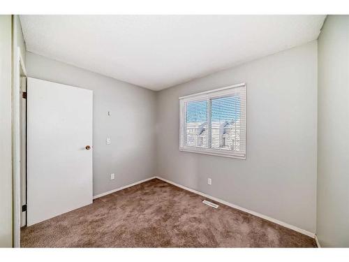 5-4360 58 Street Ne, Calgary, AB - Indoor Photo Showing Other Room