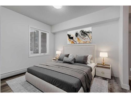 2115-604 East Lake Boulevard Se, Airdrie, AB - Indoor Photo Showing Bedroom