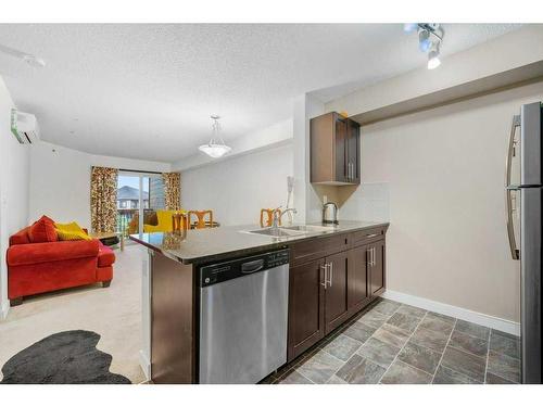 2417-81 Legacy Boulevard Se, Calgary, AB - Indoor Photo Showing Kitchen With Double Sink