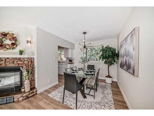 3420 Button Road Nw, Calgary, AB - Indoor Photo Showing Other Room With Fireplace