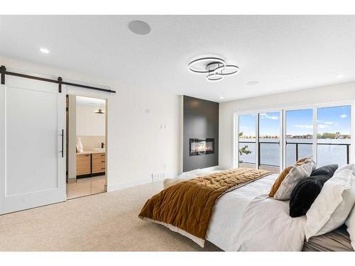 476 West Chestemere Drive, Chestermere, AB - Indoor Photo Showing Bedroom