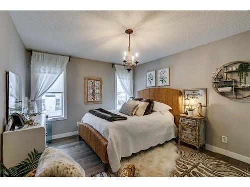 940 Woodside Lane Nw, Airdrie, AB - Indoor Photo Showing Bedroom